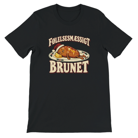 Unisex jule-T-shirt med en udmattet brunet kartoffel på en juletallerken og teksten “Følelsesmæssigt brunet”.
